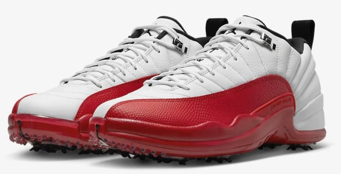 View of white and red Air Jordan shoes.